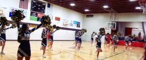 High School cheerleaders leading an all school pep rally.